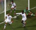 US squeeze through with late goal vs Algeria