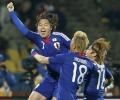 Japan stun Denmark to go through