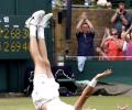 Record king Isner upstages Queen at Wimbledon