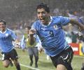 Suarez nets first Uruguay goals since biting ban