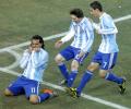 Tevez double puts Argentina in last eight