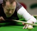 Higgins suspended over match-fixing claims