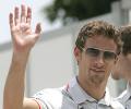 Button escapes unhurt from armed attackers