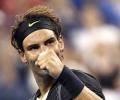 Nadal eases through after Djokovic struggles