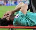 La Liga: Messi injured as Barca edge Atletico