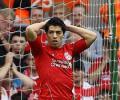 Liverpool's Suarez escapes with one match ban, fine