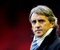 Mancini wants away-day cheer for Man City