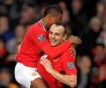 Berbatov treble puts Man United level with City