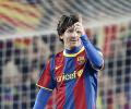 Messi hat-trick puts Barca 10 points clear