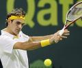 Dominant Federer through to Doha final