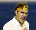 Federer survives scare from bogeyman Simon