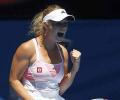 Wacky Wozniacki bounces into Melbourne quarters 