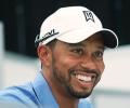 Injured Woods to miss British Open