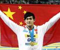 China's Sun breaks 1500 freestyle world record