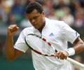 Tsonga rallies to shock Federer