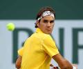 Federer, Djokovic and Roddick reach third round 