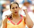 Ailing Bartoli and Wickmayer reach last four 