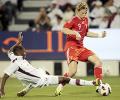 Russia's Pavlyuchenko salvages 1-1 draw in Qatar