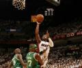 Wade shines as Heat burn Celtics in opener