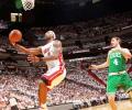 James shines as Heat finish off Celtics