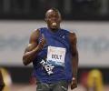 Bolt edges Powell, Americans dominate in Rome 