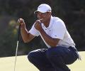 Golf: Tiger Woods takes lead at Australian Open