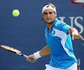 Ferrer thumps local hero Nishikori in Tokyo 