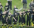 Beer-soaked Dortmund retain Bundesliga title