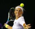 Azarenka advances in Stuttgart, Wozniacki out