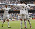 Real beat Sevilla, close in on La Liga title