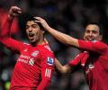 Suarez treble lifts Liverpool, defeat for Newcastle