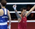 Devendro beats Beijing Games silver medalist to enter QF