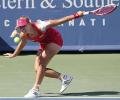 Kerber hands Serena rare loss, advances to semis