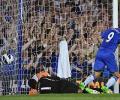 Late Chelsea flurry earns victory over Reading