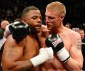 Flintoff survives knock down to win debut fight