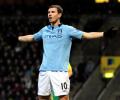 Dzeko inspires Man City as United seal win