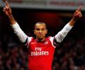 Shades of Henry as Walcott fires Arsenal hat-trick