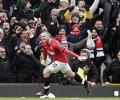 EPL: Rooney double sends United top in dramatic tie