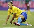 Cristiane is top scorer as flag faux-pas marks Day 1