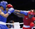 Boxers Vijender, Bhagwan storm into pre-quarter-finals