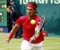 Nadal, Federer win opening matches at Halle Open