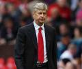 Wenger charged with improper conduct by UEFA