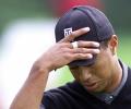 Injured Woods withdraws from WGC