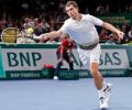 Janowicz polishes off Simon to reach Paris final