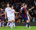 Messi nets another double as Barcelona march on