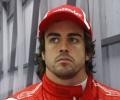 Alonso seeks to tighten grip in Singapore