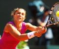 In-form Errani sends Bartoli packing in Tokyo