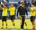 Dortmund hit six and Bayern four in easy wins