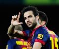 Late Fabregas goal moves Barca closer to title