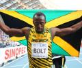 Bolt completes sprint double with ease at world athletics